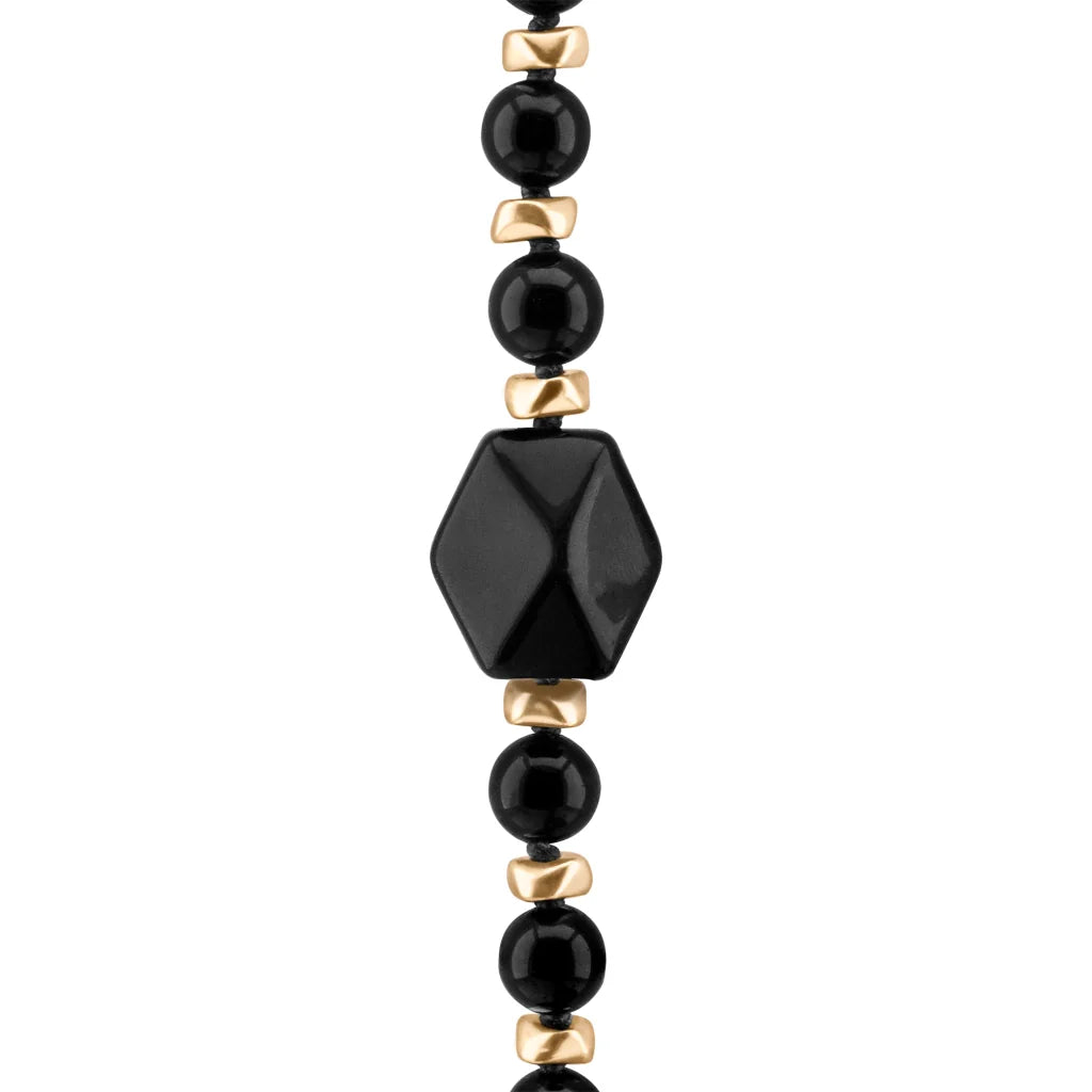 Collar de 53cm, con piedras de 8mm, con mini semillas y dije de colmillo dorados - Joyería y bisutería fina