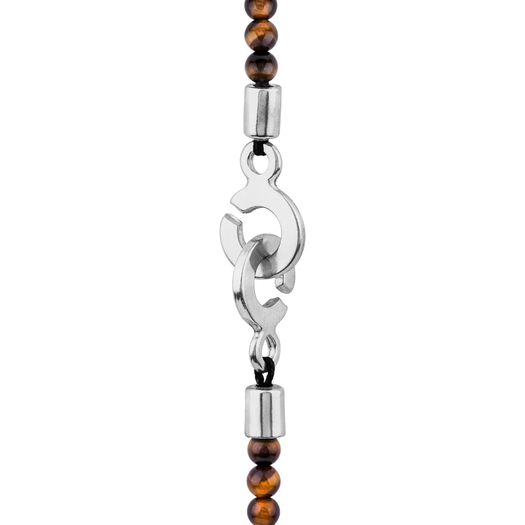 Collar de 39cm con piedras de 4mm, mini donas en acero, dije de ojo terminado en acero anticado - Joyería y bisutería fina