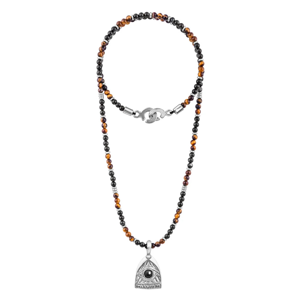 Collar de 39cm con piedras de 4mm, mini donas en acero, dije de ojo terminado en acero anticado - Joyería y bisutería fina