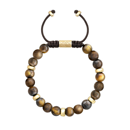 Pulsera de cuentas redondas de piedra y madera en tonos marrones y dorados, con detalles metálicos dorados y un cierre ajustable de cordón negro.
