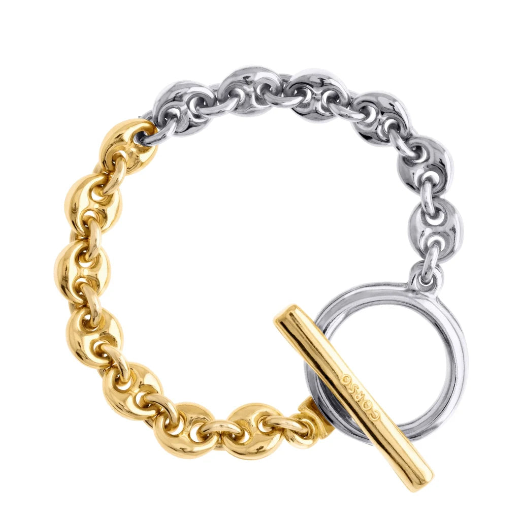 Pulsera de eslabones dorados y plateados con cierre de barra en forma de Omega, en fondo blanco. - Joyería y bisutería fina