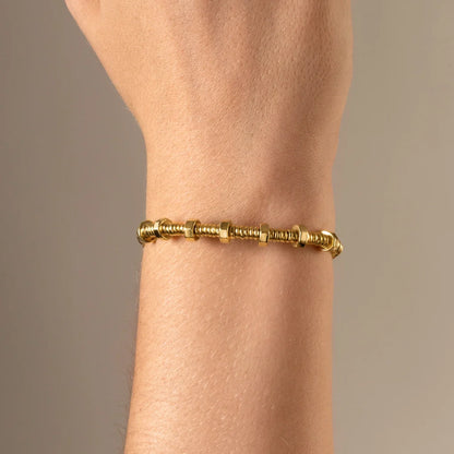 Pulsera con rondanas, donas y placa octagonal en baño de oro 22K - Joyería y bisutería fina