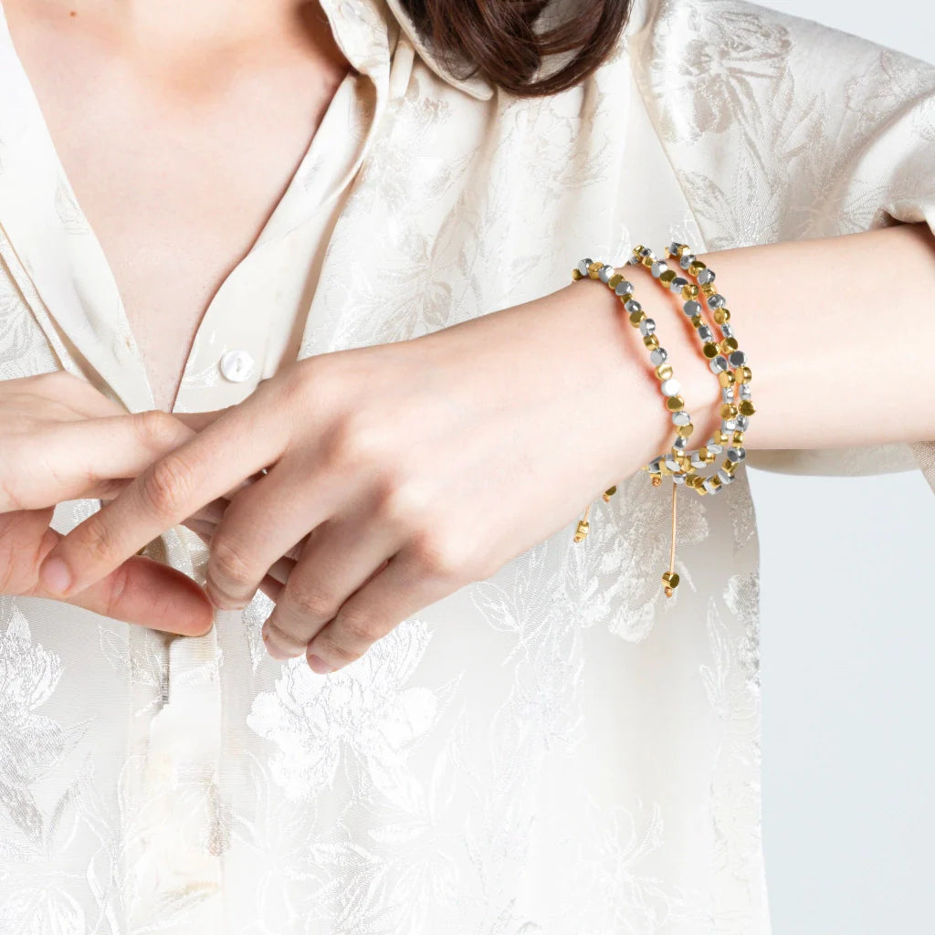 Pulsera con cuentas cilíndricas bañadas en oro 22K y rodio - Joyería y bisutería fina