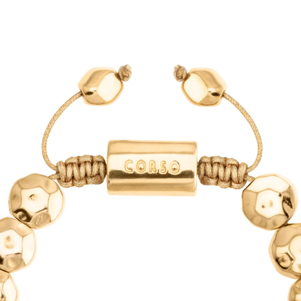 Pulsera ajustable con lunetas facetadas y placa central con insignia bañada en oro 22K - Joyería y bisutería fina