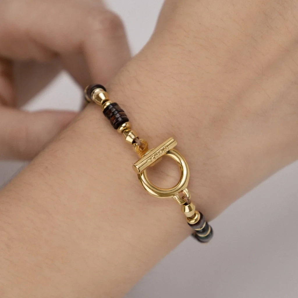 Pulsera en baño de Oro 22K con conchas filipinas talladas a mano y piedras semipreciosas - Joyería y bisutería fina
